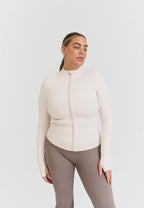 Chaqueta Softsculpt con cremallera blanca - Sisterly Tribe