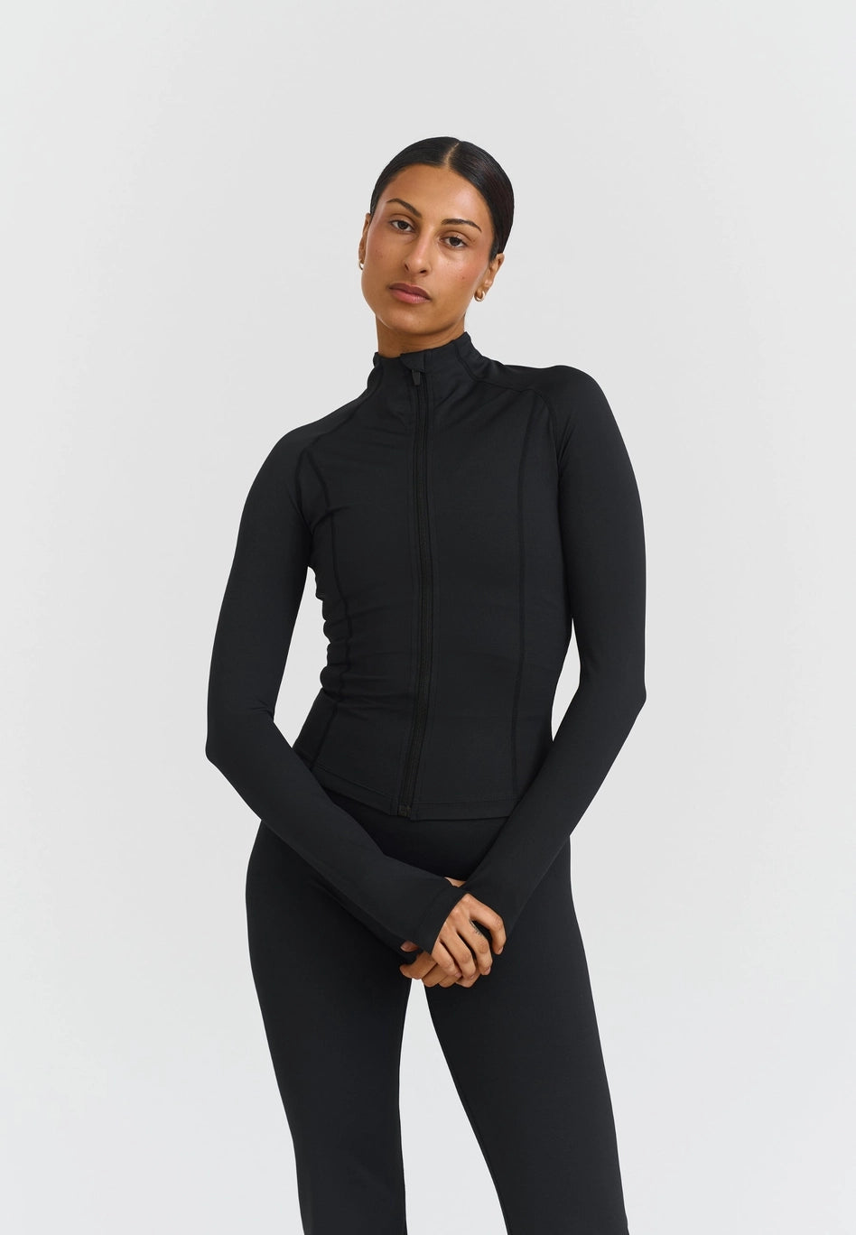 Chaqueta Softsculpt con cremallera negra - Sisterly Tribe