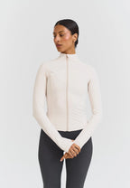 Chaqueta Softsculpt con cremallera blanca - Sisterly Tribe